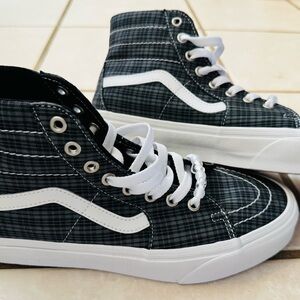Vans Black and White High-Top Sneakers